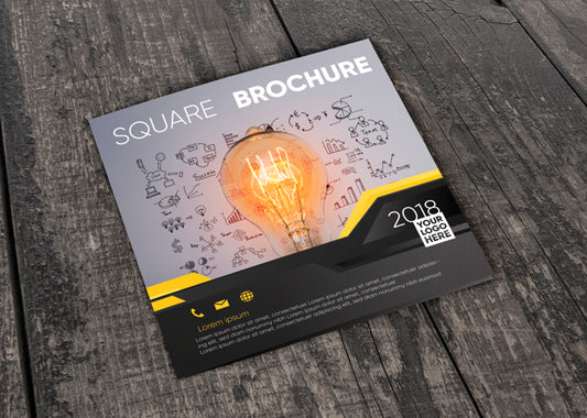 Free Square Brochure Mockup On Wooden Surface Psd