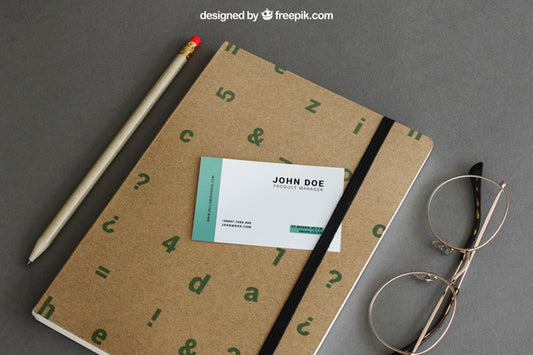 Free Stationery Mockup With Business Card On Book Psd