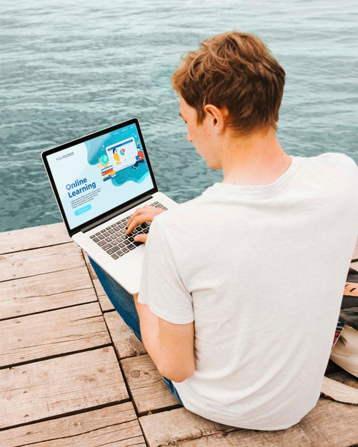 Free Student Enjoying Working Online Outdoors Psd