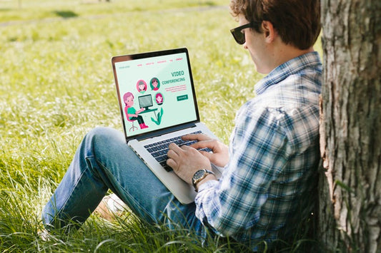 Free Student Working On Laptop Outdoors Psd