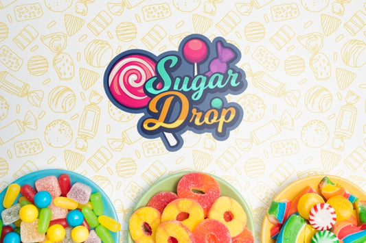 Free Sugar Drop And Plates With Delicious Assortments Of Candies Psd