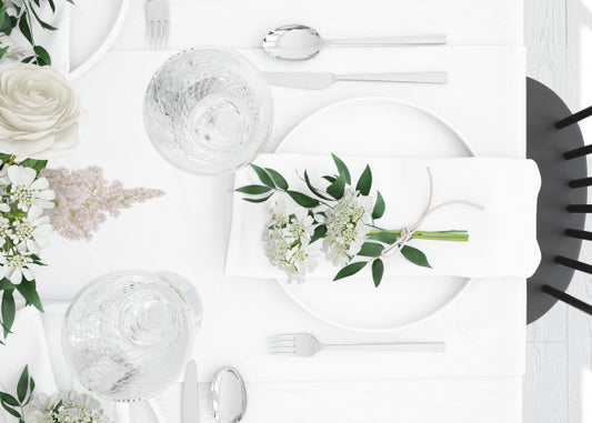 Free Table Prepared To Eat With Cutlery And Decorative Flowers On Top View Psd