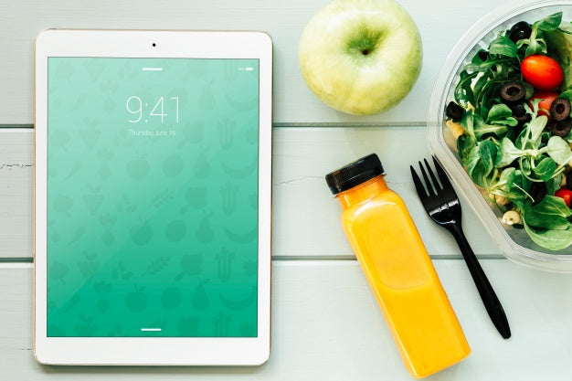 Free Tablet Mockup With Healthy Food Psd