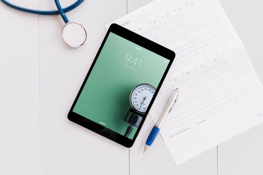 Free Tablet Mockup With Medical Elements Psd