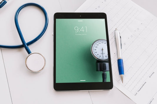 Free Tablet Mockup With Medical Elements Psd