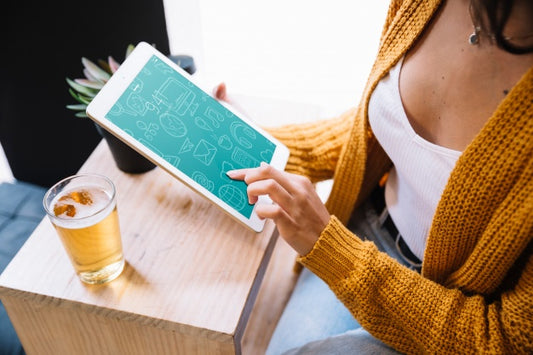 Free Tablet Mockup With Woman And Beer Psd