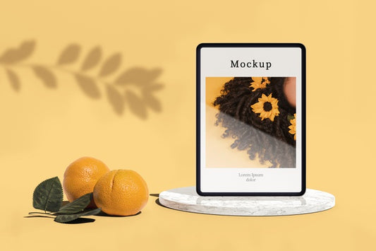 Free Tablet With Photo And Oranges Psd