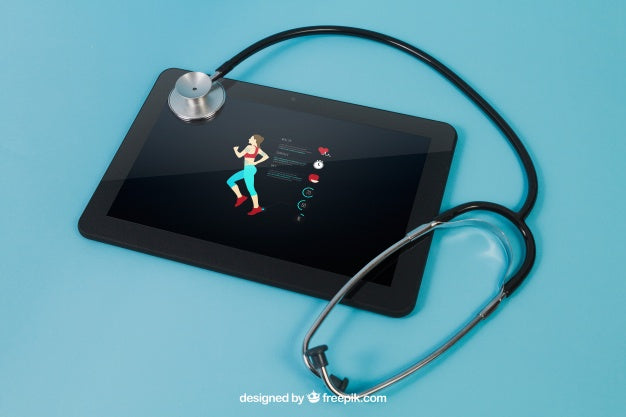 Free Tablet With Sports App And Stethoscope Psd