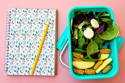 Free Take Away Food Concept With Salad And Notebook Psd