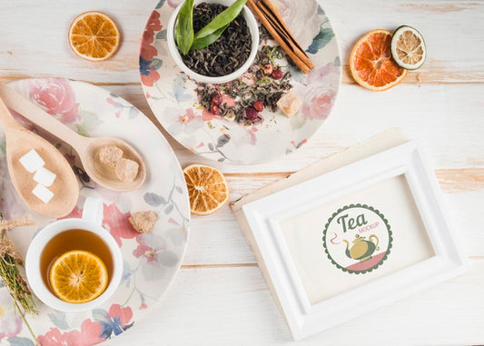 Free Tea Mock-Up With Citrus And Herbs Psd
