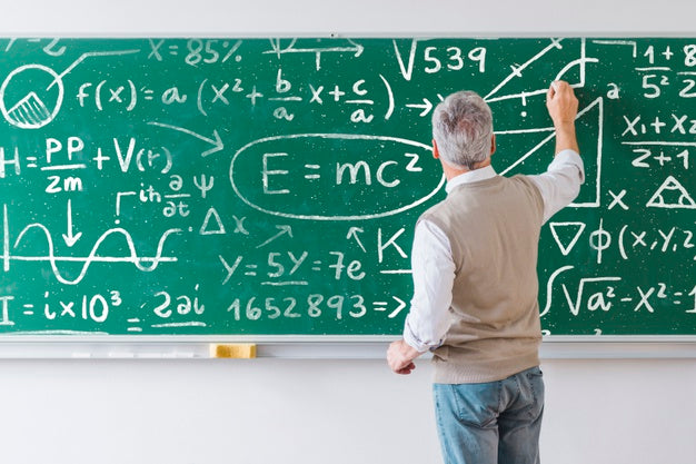 Free Teacher Writing Math Formulas On Board Psd