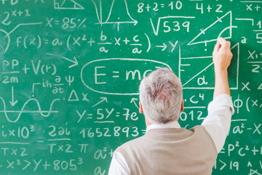 Free Teacher Writing Math Formulas On Board Psd