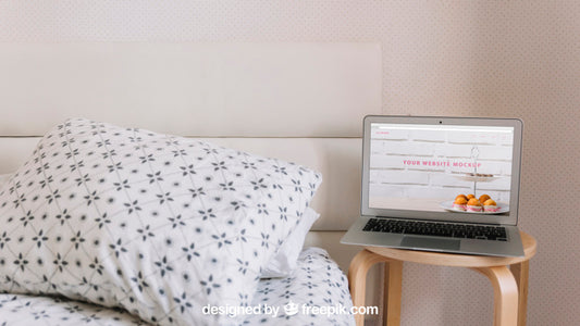 Free Technology Mockup With Laptop Next To Bed Psd