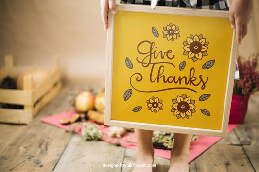 Free Thanksgiving Mockup With Girl Holding Frame Psd