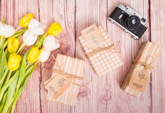Free Top View Anniversary Presents With Flowers And Camera Psd