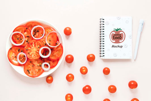 Free Top View Arrangement With Cherry Tomatoes And Notebook Psd