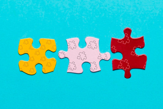 Free Top View Arrangement With Different Colored Pieces Of Puzzle Psd