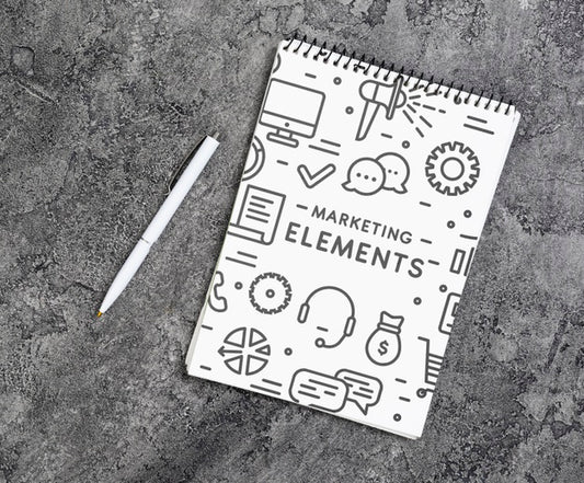 Free Top View Arrangement With Pen And Notebook Psd