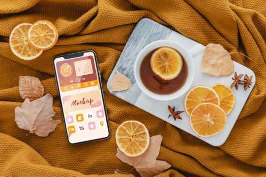 Free Top View Arrangement With Tea And Smartphone Psd