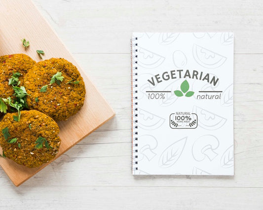 Free Top View Arrangement With Veggie Food And Notebook Psd