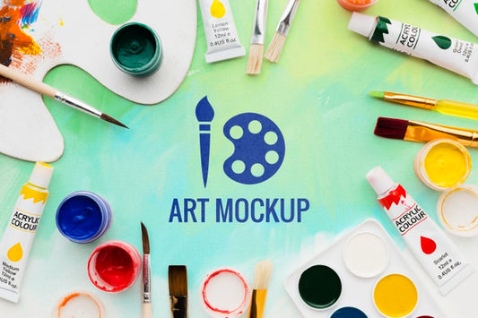 Free Top View Artist Desk With Brushes Psd
