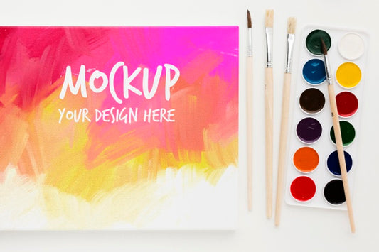 Free Top View Artist Desk With Watercolors Psd