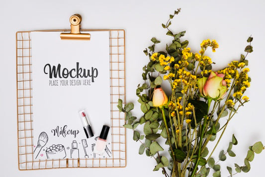 Free Top View Assortment Of Make-Up And Flowers Mock-Up Psd