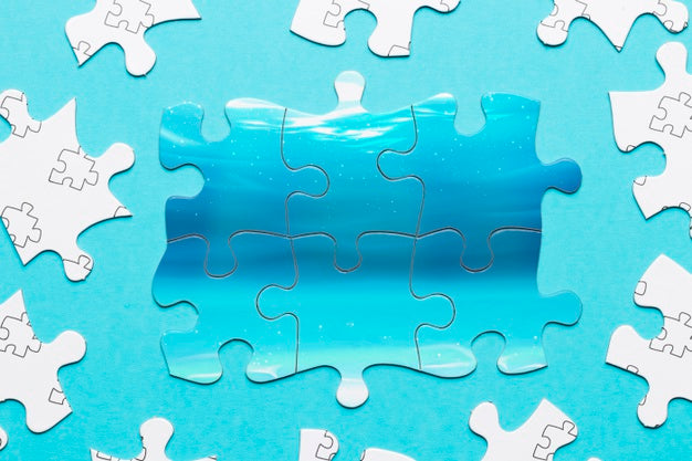 Free Top View Assortment With Puzzle Pieces Psd