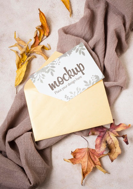 Free Top View Autumn Mock-Up With Leaves On Grey Cloth Psd