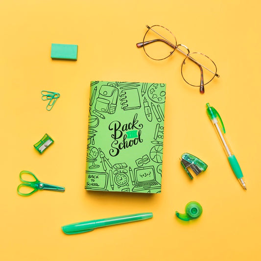 Free Top View Back To School With Green Notebook Psd