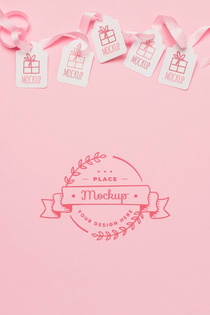 Free Top View Birthday Gift Tags Mock-Ups With Pink Ribbons Psd