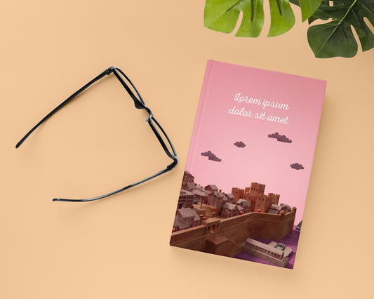 Free Top View Book And Glasses Arrangement Psd