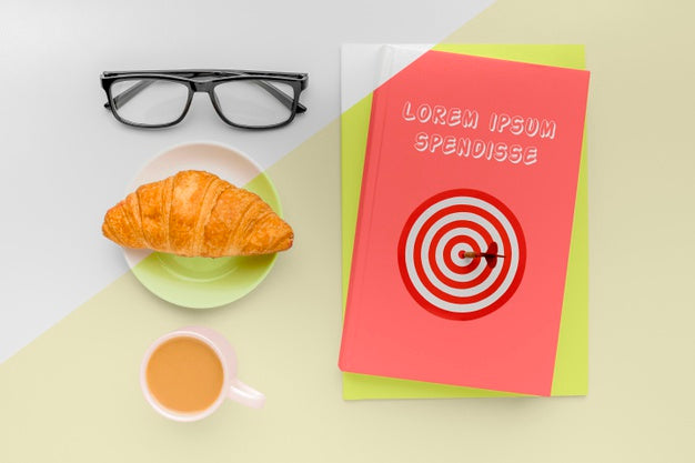 Free Top View Book Cover Mock-Up Composition With Cup Of Coffee And Croissant Psd