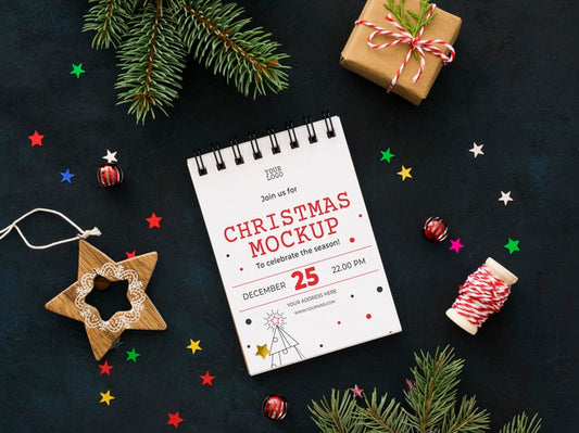 Free Top View Christmas Eve Composition With Notepad Psd