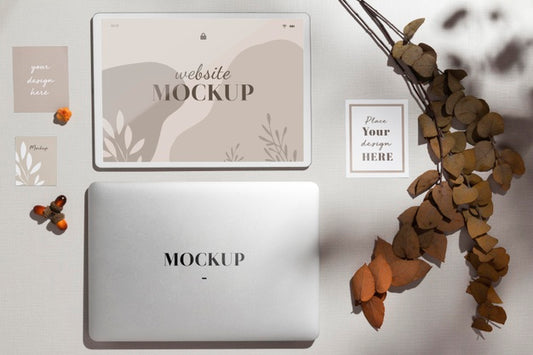 Free Top View Closed Laptop With Mockup With Leaves Psd