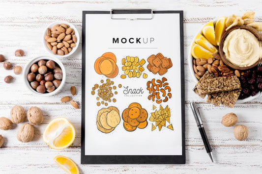 Free Top View Composition Of Snacks With Clipboard Mock-Up Psd