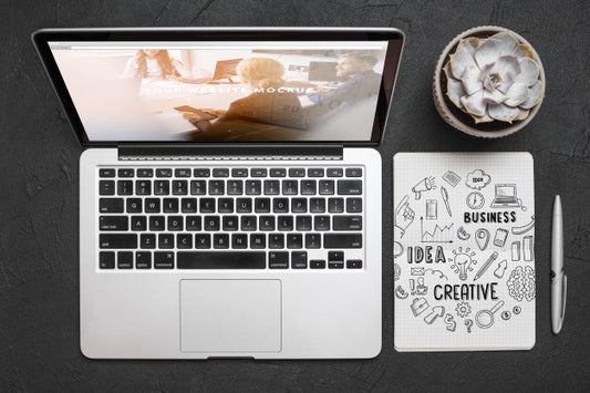 Free Top View Composition With Laptop And Office Supplies Psd