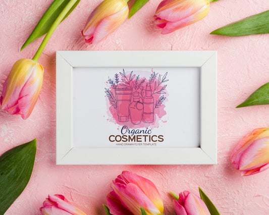 Free Top View Cosmetics Mockup With Flowers Psd