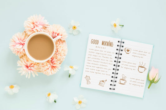 Free Top View Cup Of Coffee With Flowers Psd