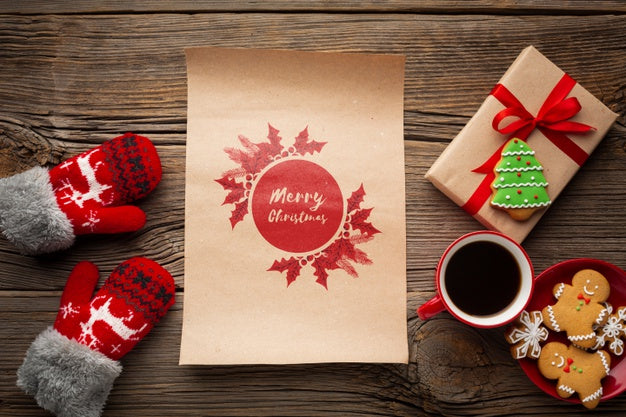 Free Top View Cup Of Coffee With Gingerbread And Gift Boxes Psd