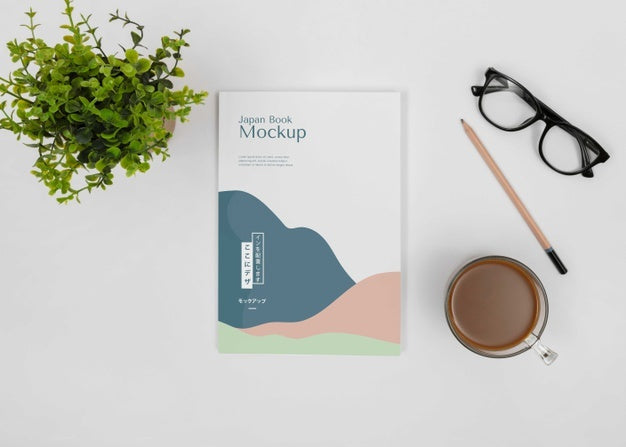 Free Top View Desk Arrangement With Book Mockup Psd