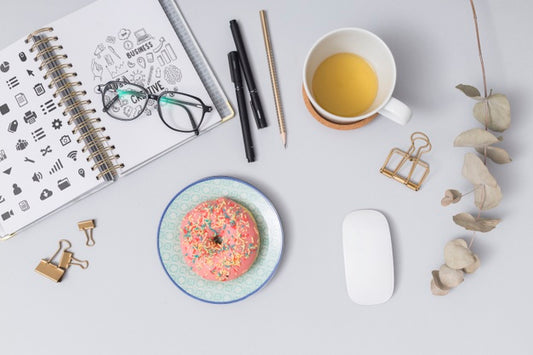 Free Top View Doughnut With Cup Of Coffee Psd