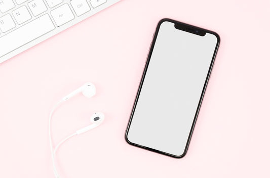 Free Top View Earphones And Smartphone Mock-Up Psd