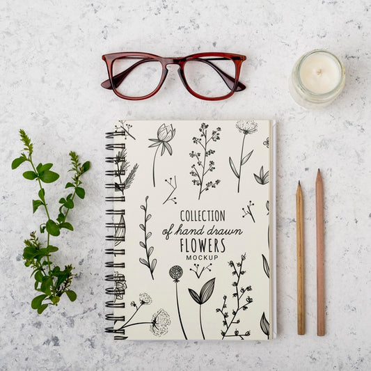 Free Top View Eyeglasses And Notepad With Mock-Up Psd