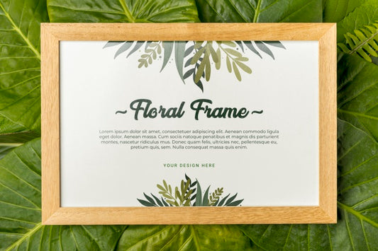 Free Top View Floral Frame Surrounded By Green Leafs Psd