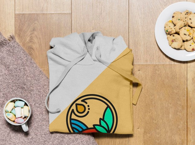 Free Top View Folded Hoodie Mock-Up With Cookies Psd