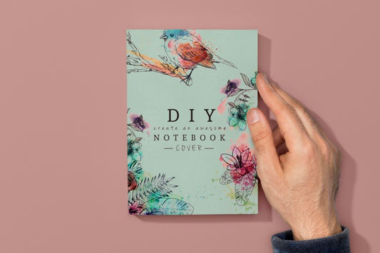 Free Top View Hand On Book Mock-Up Psd