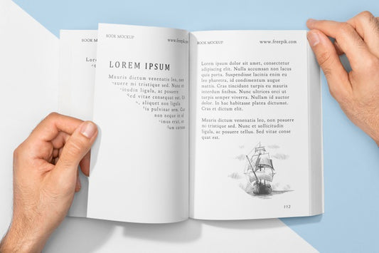 Free Top View Hand On Book Mock-Up Psd