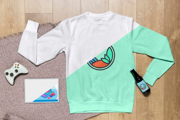 Free Top View Hoodie Mock-Up With Bottle And Gadgets Psd