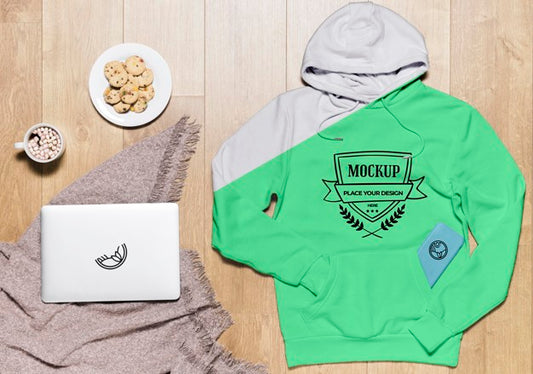 Free Top View Hoodie Mock-Up With Cookies And Tablet Psd